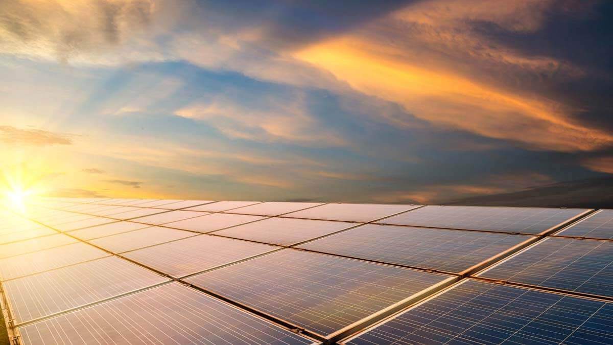 Industrial Solar Panels with Sunset